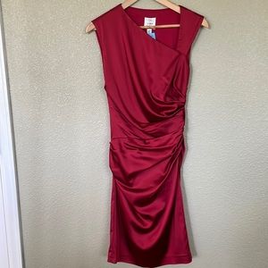 Deep red asymmetrical sleeveless cocktail dress.